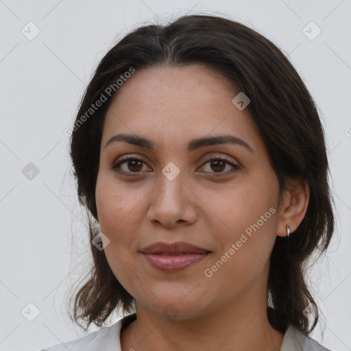 Joyful white young-adult female with medium  brown hair and brown eyes