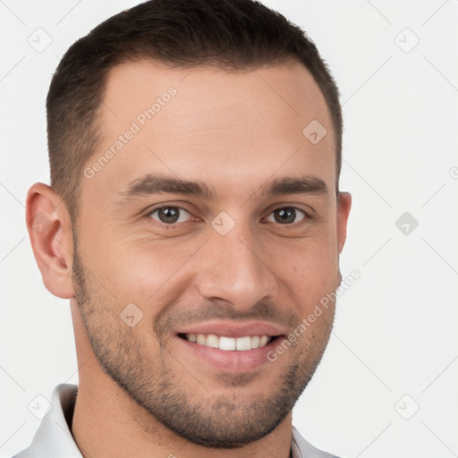 Joyful white young-adult male with short  brown hair and brown eyes