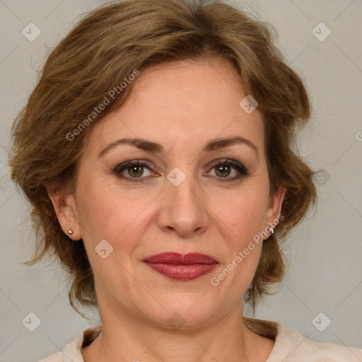 Joyful white adult female with medium  brown hair and green eyes