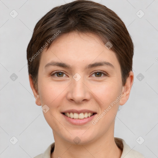 Joyful white young-adult female with short  brown hair and grey eyes