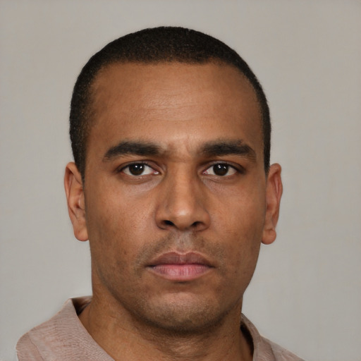 Neutral latino young-adult male with short  brown hair and brown eyes