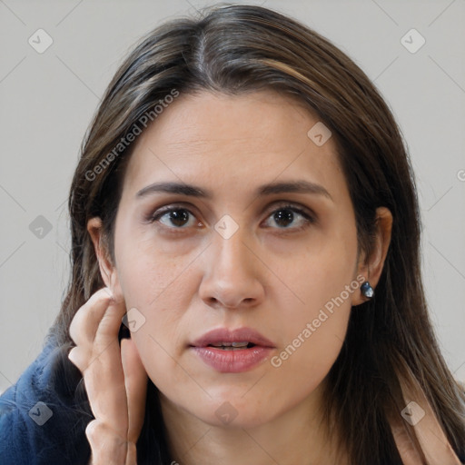 Neutral white young-adult female with medium  brown hair and brown eyes