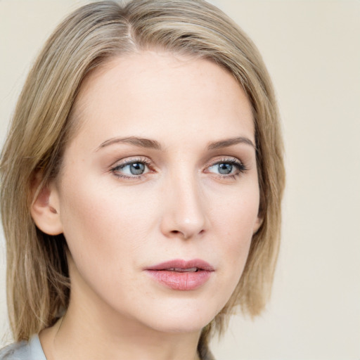 Neutral white young-adult female with medium  brown hair and blue eyes