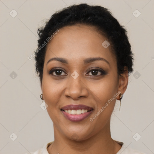 Joyful latino young-adult female with short  black hair and brown eyes