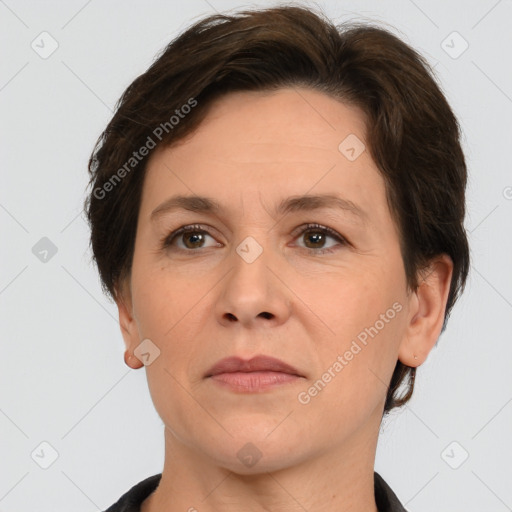 Joyful white adult female with short  brown hair and brown eyes