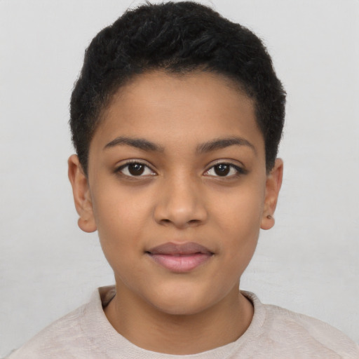 Joyful latino child female with short  brown hair and brown eyes
