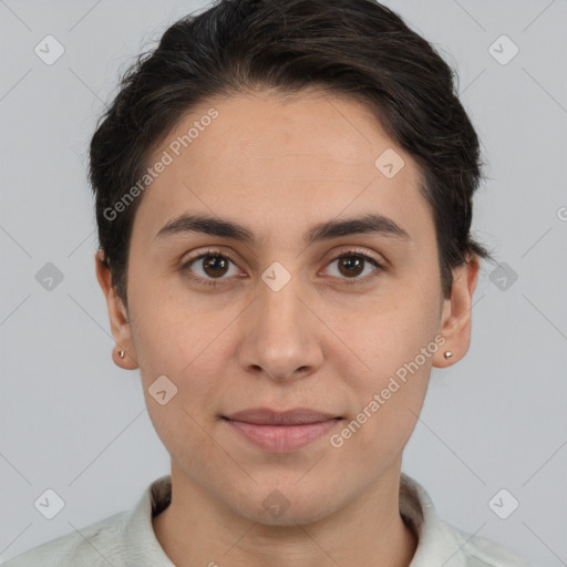 Joyful white young-adult female with short  brown hair and brown eyes