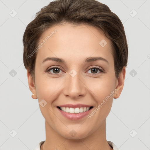 Joyful white young-adult female with short  brown hair and brown eyes