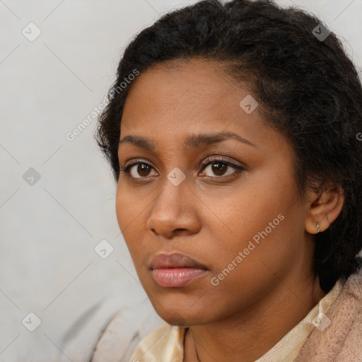 Neutral black young-adult female with short  brown hair and brown eyes