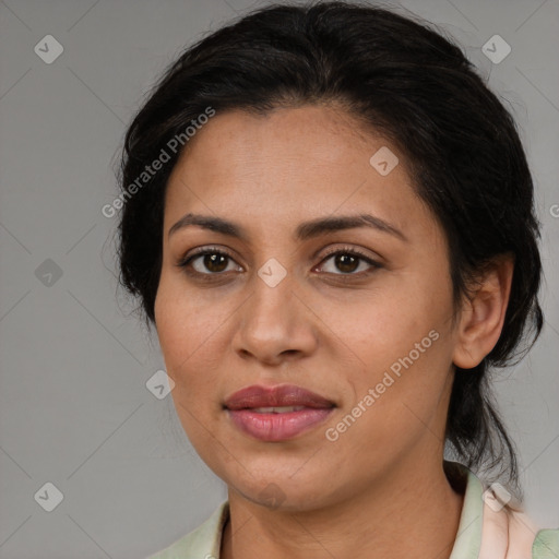 Joyful latino young-adult female with medium  brown hair and brown eyes