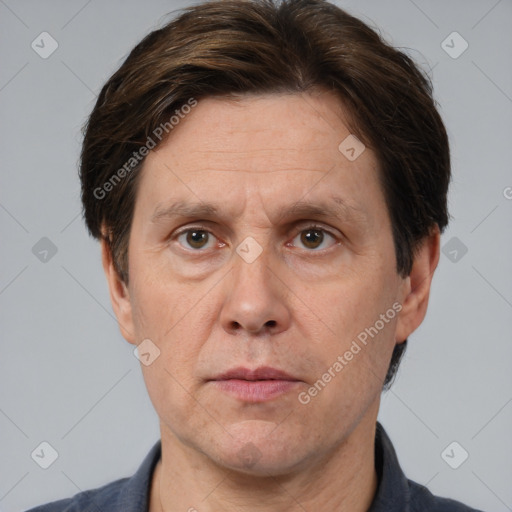 Neutral white adult male with short  brown hair and brown eyes