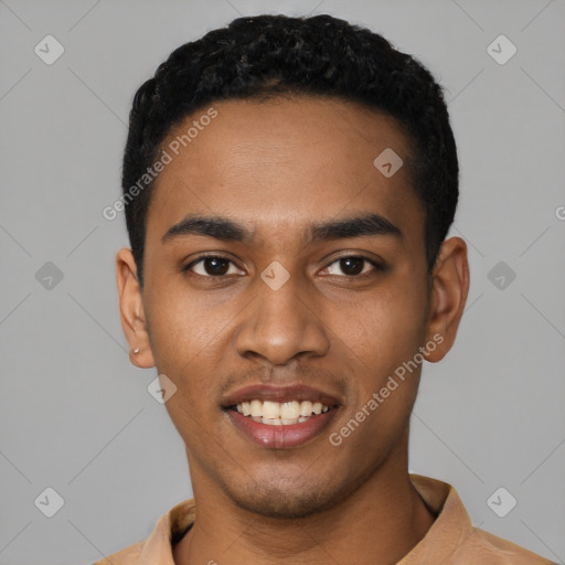 Joyful black young-adult male with short  black hair and brown eyes