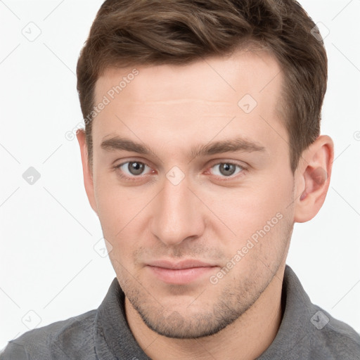 Neutral white young-adult male with short  brown hair and grey eyes