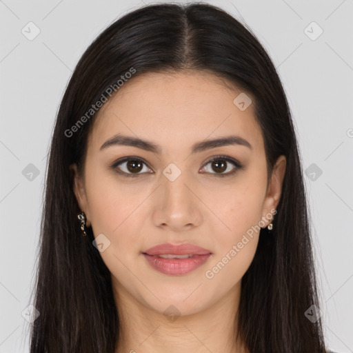 Joyful latino young-adult female with long  brown hair and brown eyes