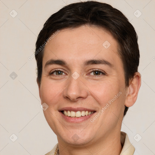 Joyful white young-adult female with short  brown hair and brown eyes