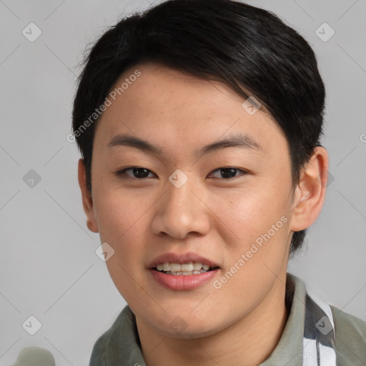 Joyful asian young-adult male with short  brown hair and brown eyes