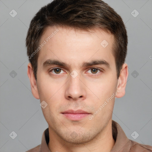 Neutral white young-adult male with short  brown hair and grey eyes