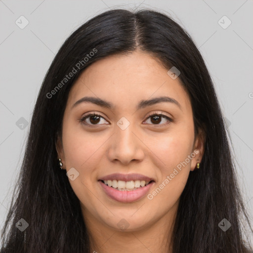 Joyful latino young-adult female with long  brown hair and brown eyes