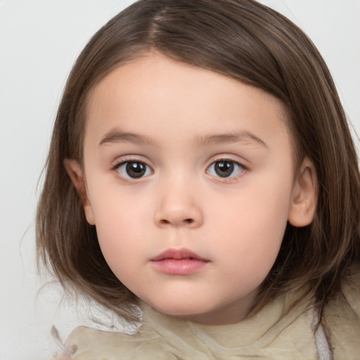 Neutral white child female with medium  brown hair and brown eyes