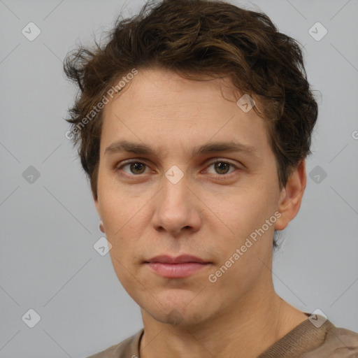 Neutral white young-adult male with short  brown hair and grey eyes