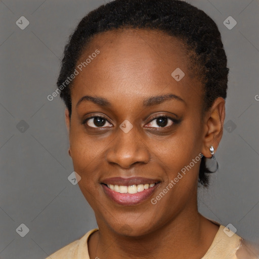 Joyful black young-adult female with short  brown hair and brown eyes