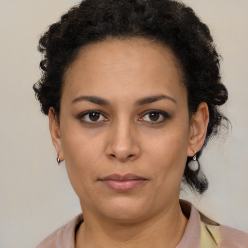 Neutral latino young-adult female with short  black hair and brown eyes
