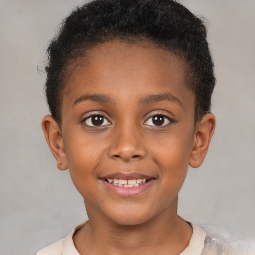 Joyful black child female with short  brown hair and brown eyes