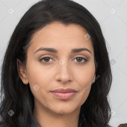 Joyful latino young-adult female with long  brown hair and brown eyes