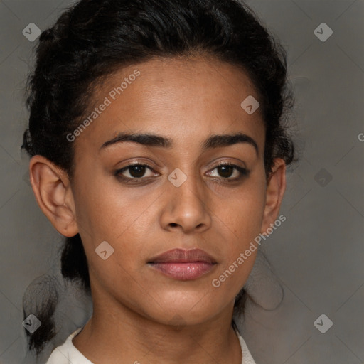 Neutral black young-adult female with short  brown hair and brown eyes