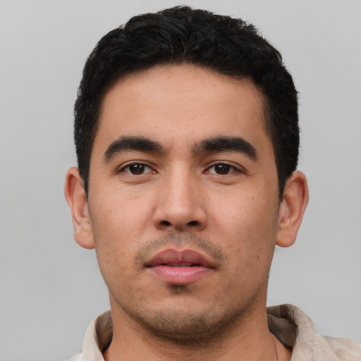 Neutral latino young-adult male with short  black hair and brown eyes