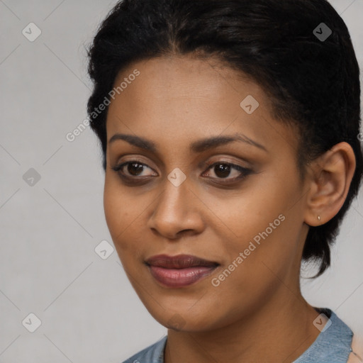 Joyful black young-adult female with medium  black hair and brown eyes