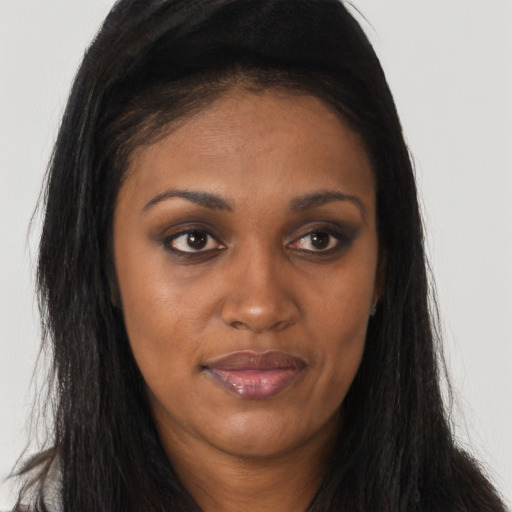 Joyful asian young-adult female with long  brown hair and brown eyes