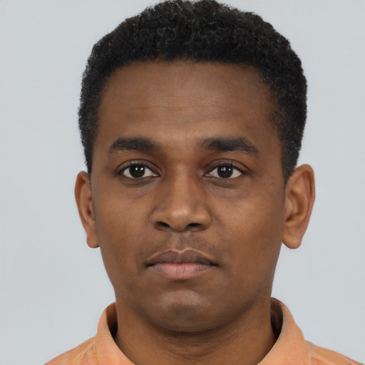 Neutral black young-adult male with short  black hair and brown eyes
