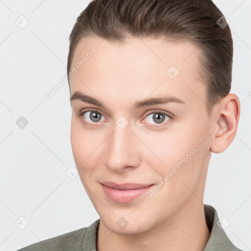 Joyful white young-adult female with short  brown hair and brown eyes