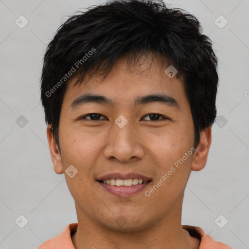 Joyful asian young-adult male with short  black hair and brown eyes