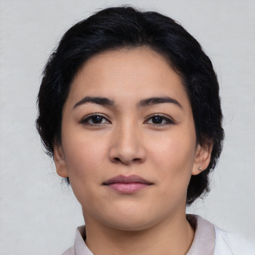 Neutral latino young-adult female with medium  black hair and brown eyes