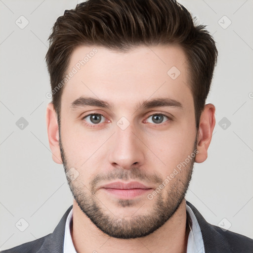 Neutral white young-adult male with short  brown hair and brown eyes