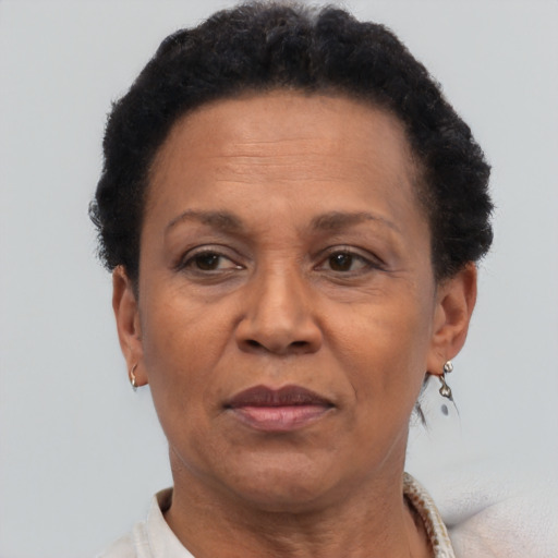 Neutral black adult female with short  brown hair and brown eyes
