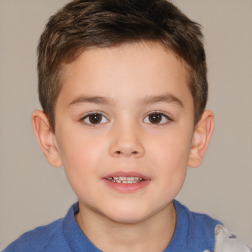 Joyful white child male with short  brown hair and brown eyes