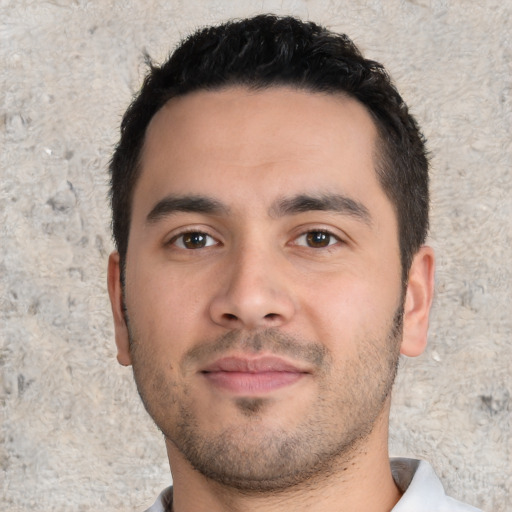 Neutral white young-adult male with short  black hair and brown eyes