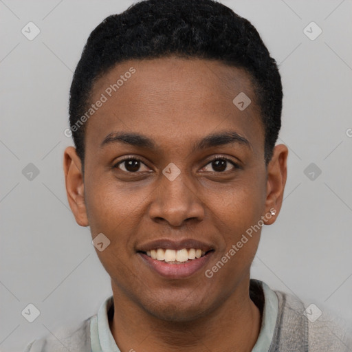 Joyful black young-adult male with short  black hair and brown eyes