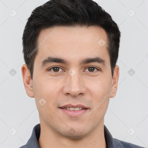 Joyful white young-adult male with short  black hair and brown eyes