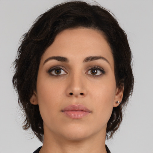 Neutral asian young-adult female with medium  brown hair and brown eyes