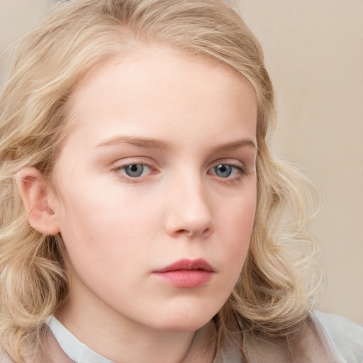 Neutral white child female with medium  blond hair and blue eyes