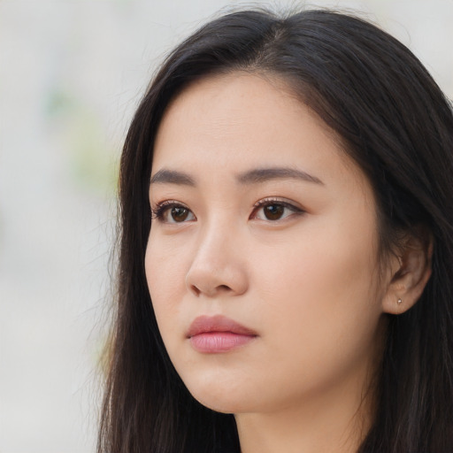 Neutral asian young-adult female with long  brown hair and brown eyes