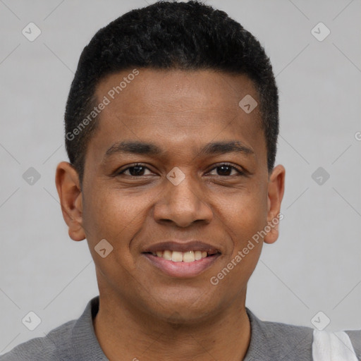 Joyful black young-adult male with short  brown hair and brown eyes