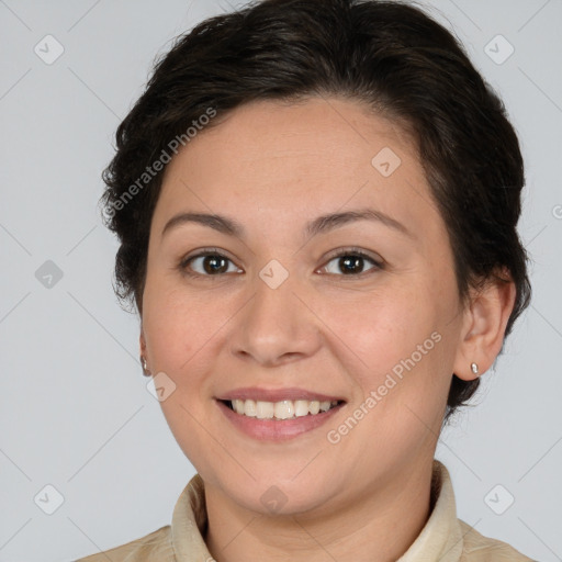 Joyful white adult female with medium  brown hair and brown eyes