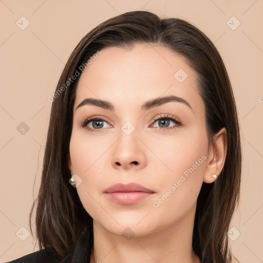 Neutral white young-adult female with long  brown hair and brown eyes