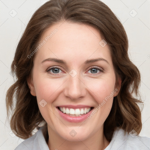 Joyful white young-adult female with medium  brown hair and green eyes