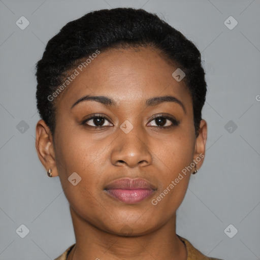 Joyful black young-adult female with short  black hair and brown eyes